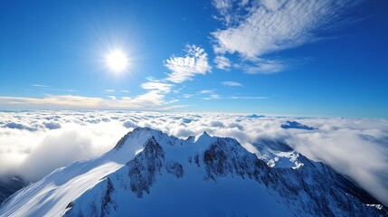 Obraz premium Sunny mountain landscape showcasing vast snowcapped peaks under a clear blue sky and white clouds : Generative AI