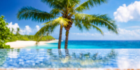 Obraz premium Tranquil Beach Paradise Infinity Pool View