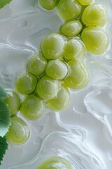 Vibrant green grape with glossy surface against the white background.
