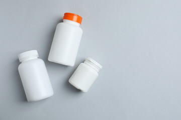 White bottles on a gray background