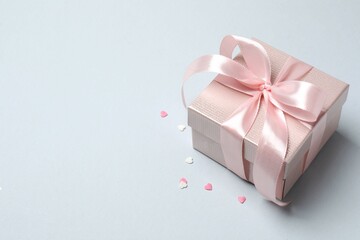 Beautiful gift box on gray background