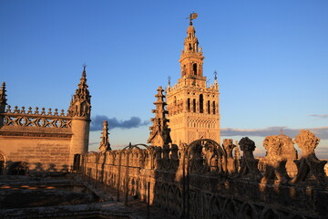 Obraz premium La Giralda, a former minaret of the great mosque of Seville (Spain), later converted to a bell tower for the Cathedral.