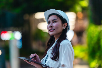 Female Architect Supervising Green Urban Development