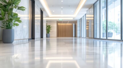 Fototapeta premium Modern office hallway with polished marble floors and greenery, bright lighting