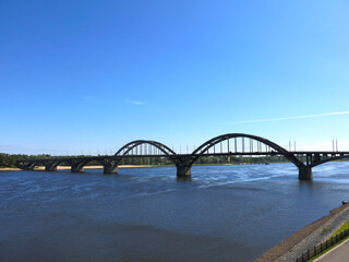Obraz premium Automobile and pedestrian bridge over the Volga River in the city of Rybinsk, Yaroslavl region