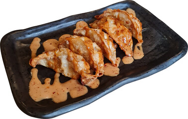 dumplings with spicy Sauce, Tasty asian food, gyoza, Chinese food, dicut, PNG file, isolated background.
