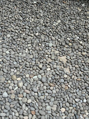 grey small pebbles detailed close up texture photo for wallpaper background