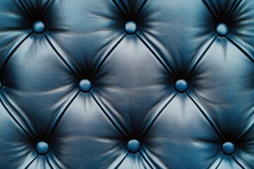 Fototapeta premium A close-up shot of a blue leather upholstery, perfect for interior design and furniture photoshoots