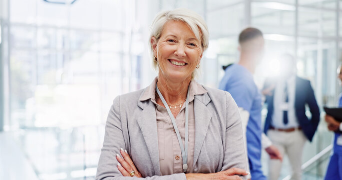 Portrait, mature or happy woman with confidence at hospital for medical organization or campaign. Female person, board director or healthcare manager with smile or arms crossed for health development