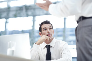 Office, teamwork and businessman with laptop for discussion, investment update and listening to...