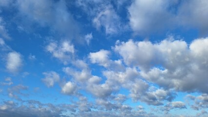 Beautiful Blue Sky with Fluffy White Clouds