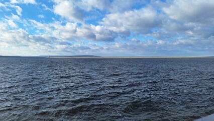 Calm Waters Beneath a Cloudy Sky