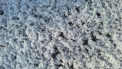 Close-Up of Snowy Surface with Intricate Patterns