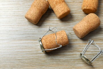 Champagne corks on wooden background