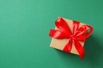 Beautiful gift box on color background 