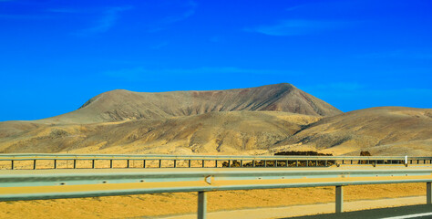 Extinct volcanoes in Fuerteventura as seen from a car