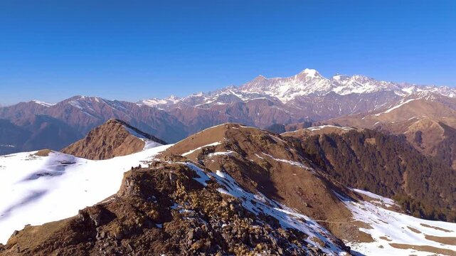 A mesmerizing glimpse of summit of dayara bgya winetr trk, showcasing the natural beauty and scenic wonders of the region.