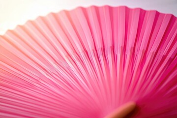 A close-up view of a pink umbrella with intricate details