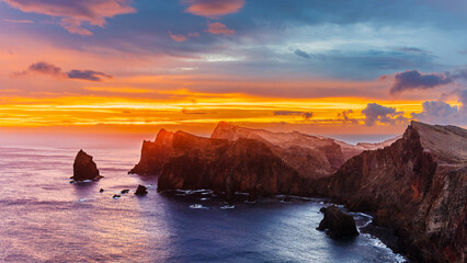 The easternmost part of the Portuguese island of Madeira is called Ponto sao Lourenco. The colourful cliffs are surrounded by the Atlantic Ocean. The easternmost tip of Madeira at sunrise © Petr