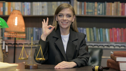 Portrait of Female Lawyer with Okay Sign