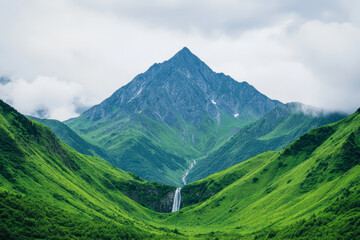 Fototapeta premium Majestic mountain landscape. Dramatic mountain landscape with towering cliffs and waterfall