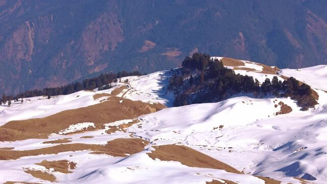 Captured in breathtaking detail, winter view of from summit view of dayra bgyal, showcasing the natural beauty and scenic wonders of the region.