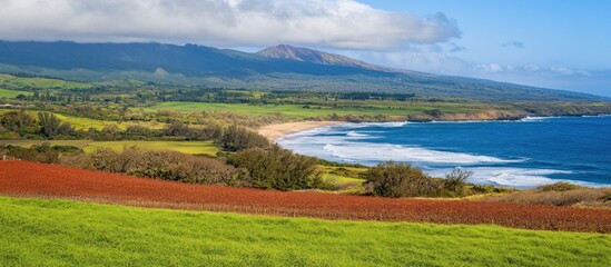 Maui coastal farmland, ocean waves, volcanic mountains