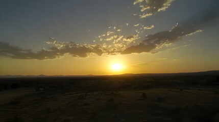 Sunset landscape. Golden sun over horizon, countryside view. Nature background for web, presentation, advertising, posters, and prints