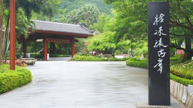 Temple entrance view with trees in foreground, lush green foliage. Ideal for travel, and spirituality blogs