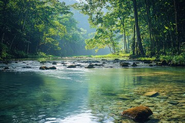 Obraz premium Tropical river flows through lush jungle; misty mountains background; idyllic nature scene