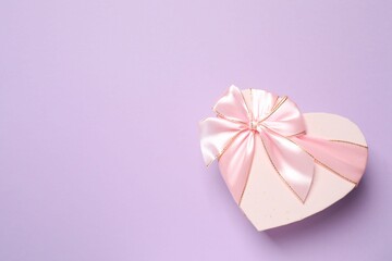 Beautiful gift box on color background