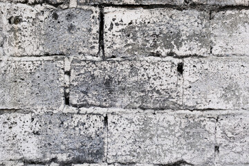 Old and aged grey brick wall texture background