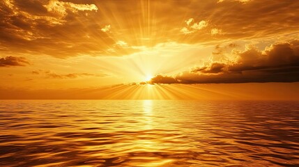 Golden Sunset Over Calm Ocean with Radiant Rays of Light Breaking Through Clouds