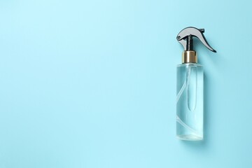 Cosmetic bottle on blue background 