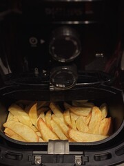 Healthy Homemade French Fries Cooking in Air Fryer Basket