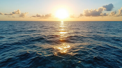Obraz premium breathtaking sunset over ocean, with warm golden hues reflecting on water