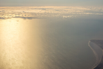 London, United Kingdom, England, a view of a beach next to a body of water