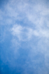 Obraz premium A Serene Blue Sky with Gentle Clouds Provides the Perfect Tranquil Backgrounds for Relaxation