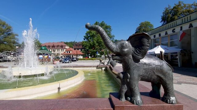 Fountain with elephants in front of main building of health resort Rabka Zdroj, Poland