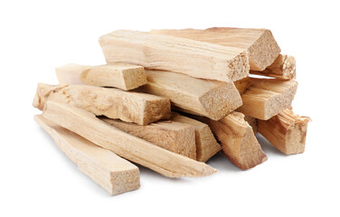Pile of palo santo sticks on white background