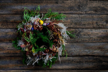 Beautiful Natural Rustic Wreath Decor Graced on a Charming Wooden Background Surface