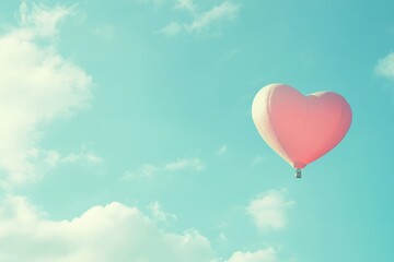 Fototapeta premium Pink Heart Shaped Hot Air Balloon Soaring in a Pastel Sky