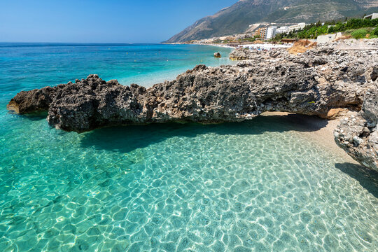 Albania, Vlor&euml; County, Dh&euml;rmi - 14 August 2024 - Particular rock in the turquoise Albanian sea