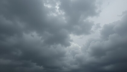 Obraz premium Dark and Dramatic Cloudy Sky with Overcast Weather Conditions