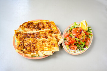Kiymali pide. Turkish pide with minced meat. Turkish pizza mince pita Pide on white background. Etli ekmek. Kusbasi kasarli, kiymali kasarli, kiymali yumurtali, Bafra, Trabzon, Kusbasili pide.