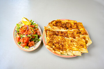 Kiymali pide. Turkish pide with minced meat. Turkish pizza mince pita Pide on white background. Etli ekmek. Kusbasi kasarli, kiymali kasarli, kiymali yumurtali, Bafra, Trabzon, Kusbasili pide.