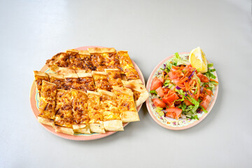 Kiymali pide. Turkish pide with minced meat. Turkish pizza mince pita Pide on white background. Etli ekmek. Kusbasi kasarli, kiymali kasarli, kiymali yumurtali, Bafra, Trabzon, Kusbasili pide.
