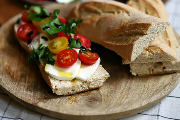 Open sandwich with mozzarella on italian bread