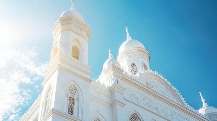 Obraz premium Sunny day, white mosque, blue sky, architectural detail, travel