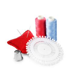Threads and other sewing supplies isolated on white